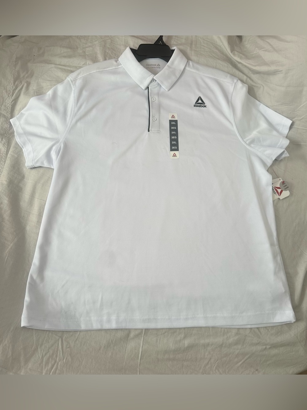 Reebok Men’s White Polo with Subtle Logo